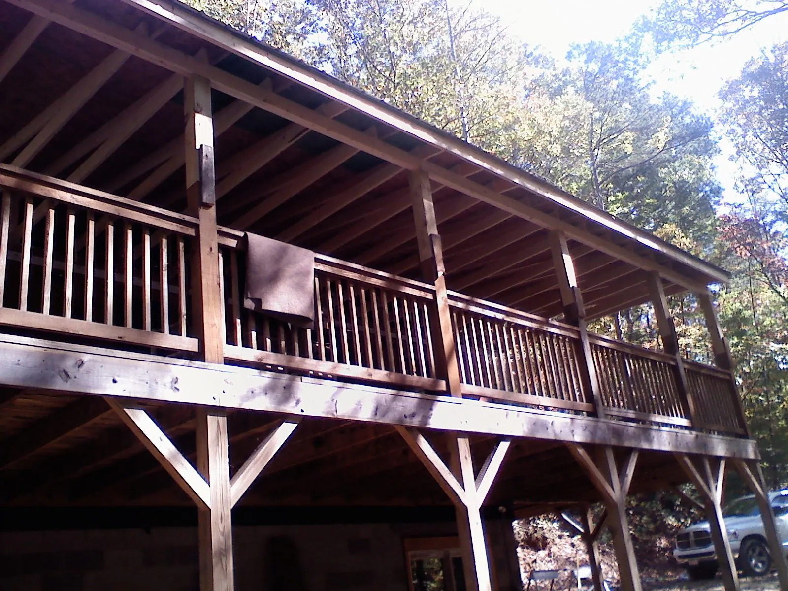 Timber framing under a new elevated porch and deck — Roof Leak Repair in Milnor by Roofing Brothers
